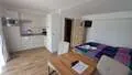 Apartmán č. 1 — obytná část s jídelním prostorem